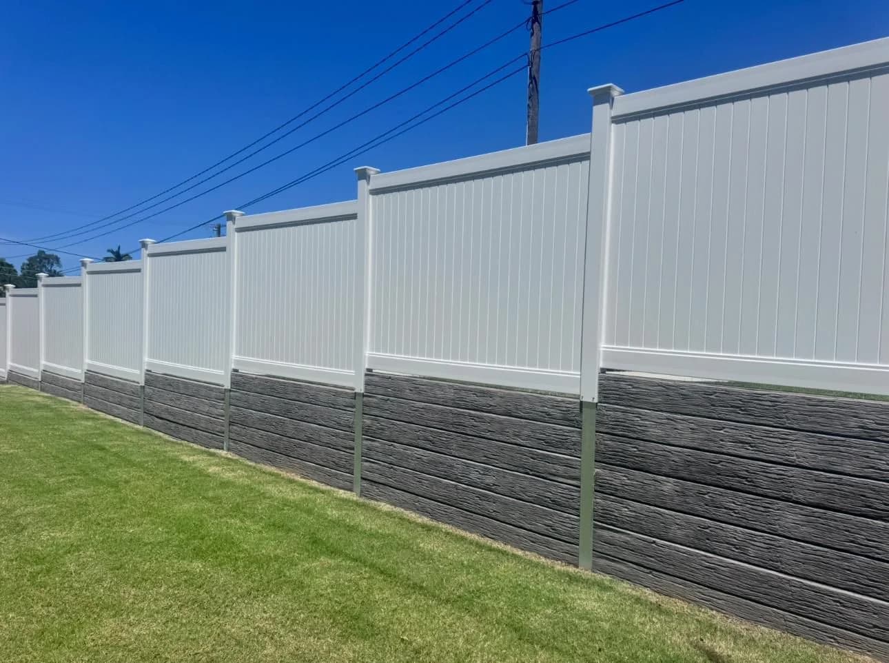 Full privacy PVC panels on concrete sleeper retaining wall